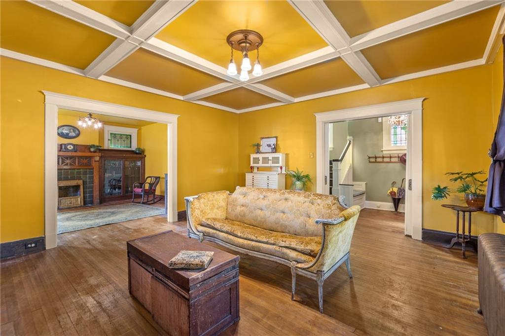 1139 Davis Avenue Pittsburgh, PA 15212 - Photo 8 of 35 a living room with furniture and a wooden floor