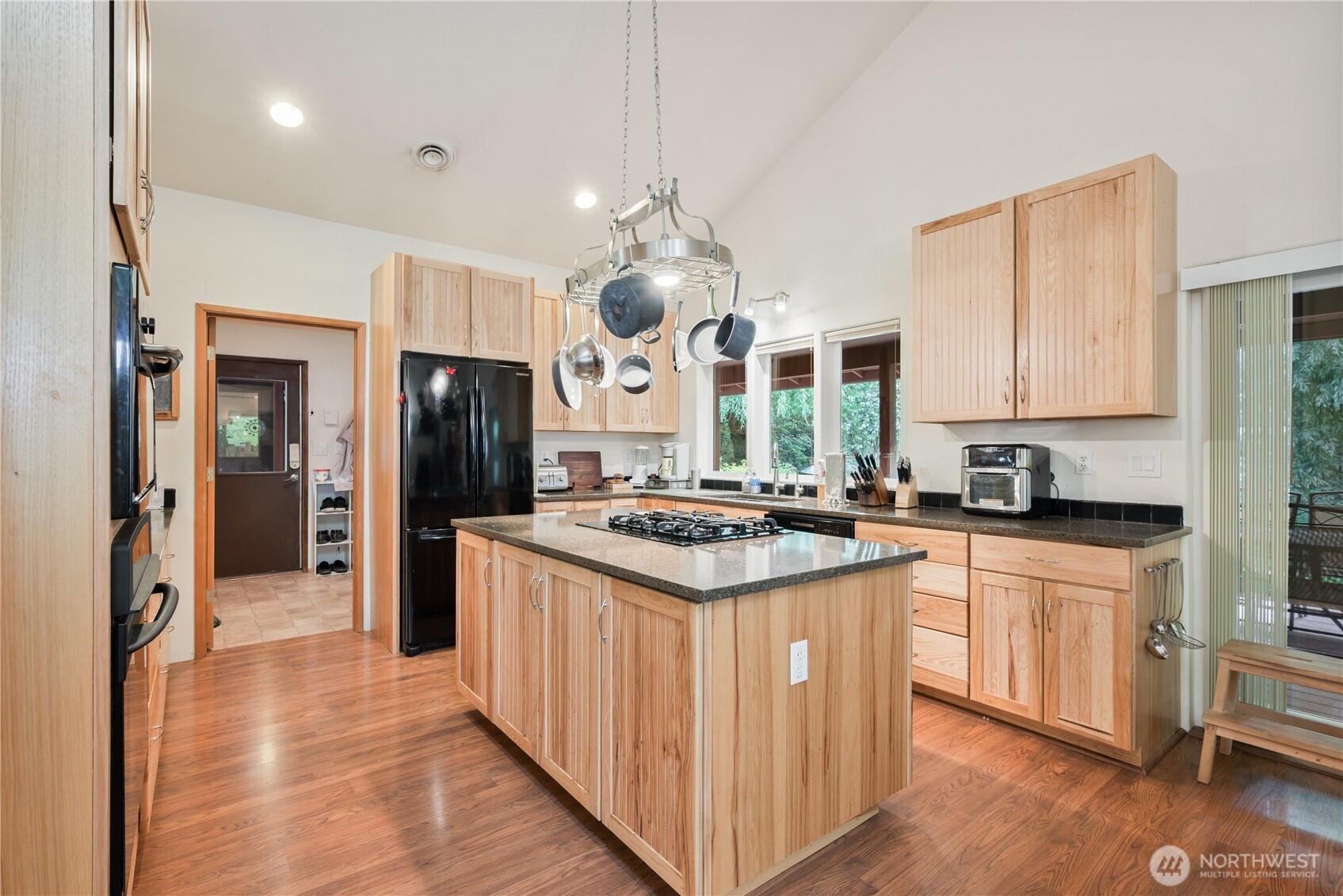1975 Coal Creek Road Longview, WA 98632 - Photo 12 of 35 a kitchen with stainless steel appliances granite countertop a stove and a refrigerator