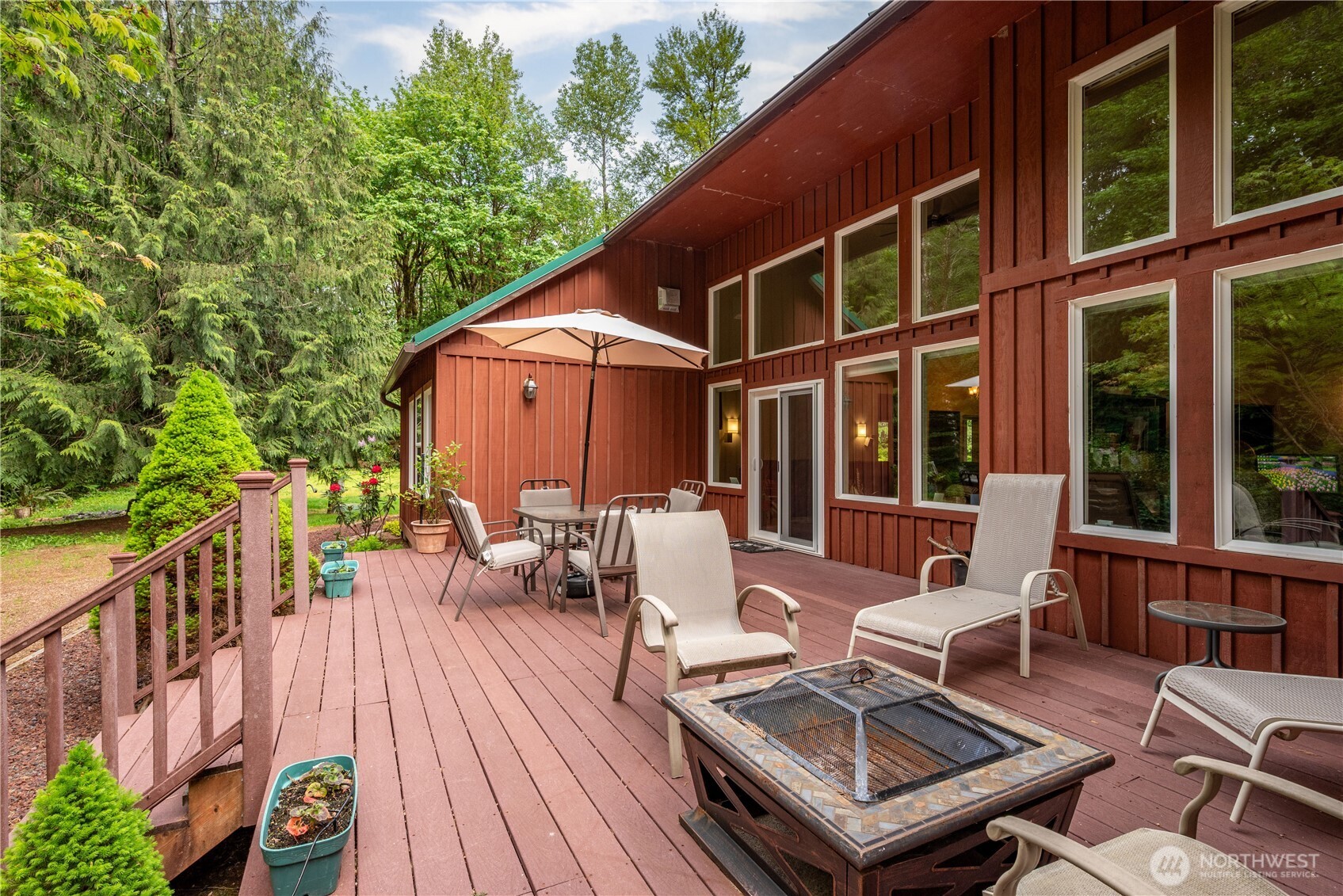 1975 Coal Creek Road Longview, WA 98632 - Photo 30 of 35 a view of a patio with couches table and chairs and potted plants