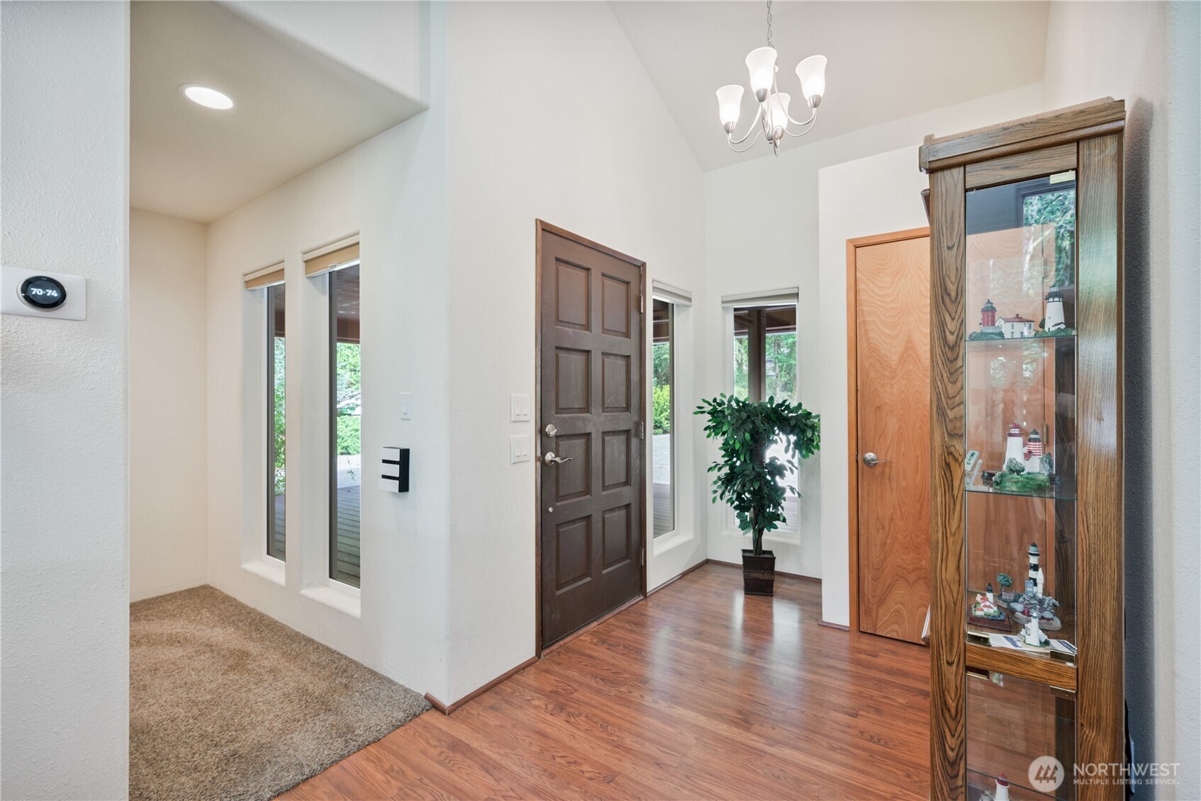 1975 Coal Creek Road Longview, WA 98632 - Photo 9 of 35 a view of a kitchen with an entryway and wooden floor