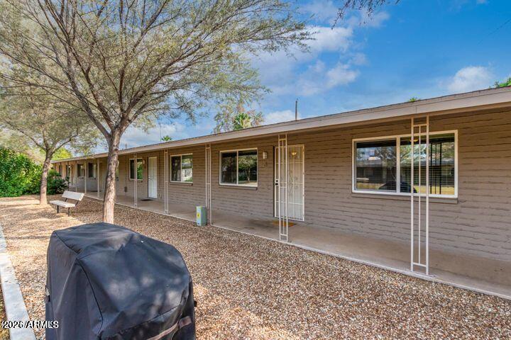 6819 North 12th Street, Unit 2 Phoenix, AZ 85014 - Photo 2 of 17 front view of a house with a yard