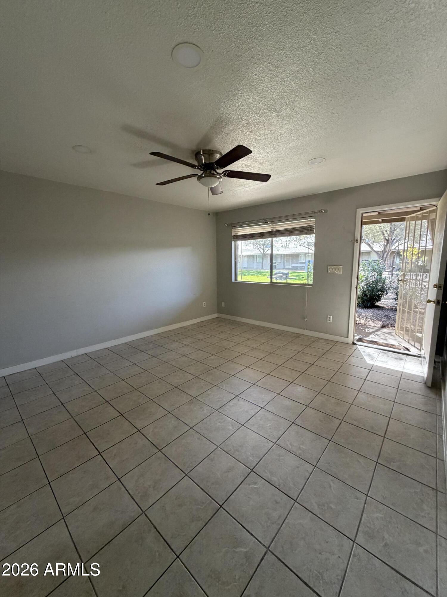 6819 North 12th Street, Unit 2 Phoenix, AZ 85014 - Photo 6 of 17 a view of an empty room and window
