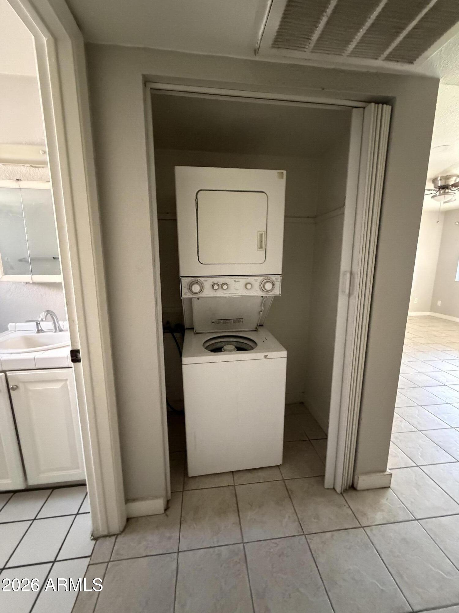 6819 North 12th Street, Unit 2 Phoenix, AZ 85014 - Photo 10 of 17 a utility room with dryer and washer
