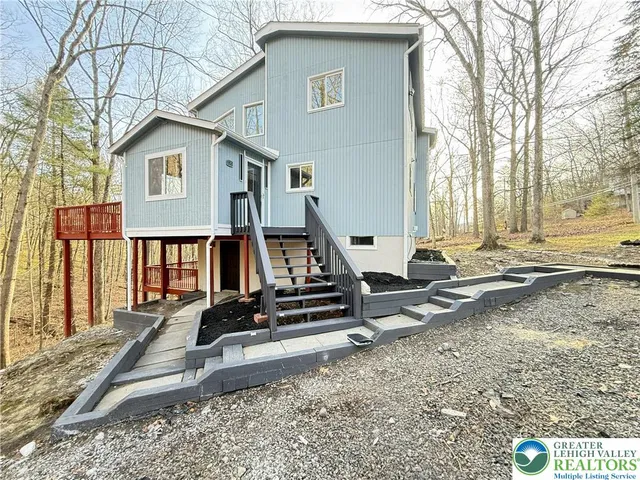 a bike parked in front of a house