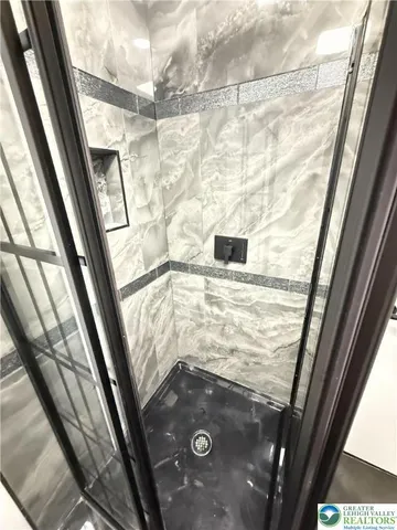 a view of porch with wooden floor