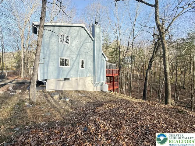 a kitchen with a sink a stove a microwave and cabinets