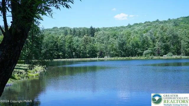 an aerial view of a multi story residential apartment building