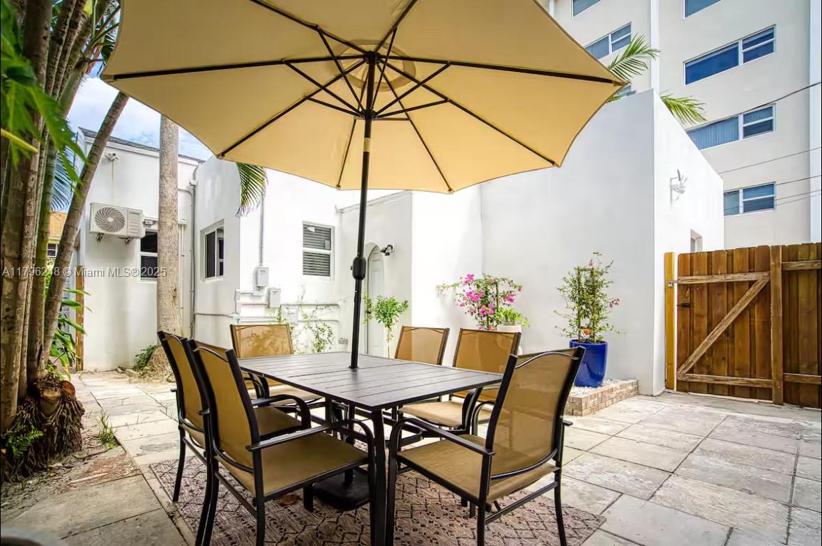 310 Oregon Street, Unit 3 Hollywood, FL 33019 - Photo 3 of 17 a view of an outdoor space with furniture