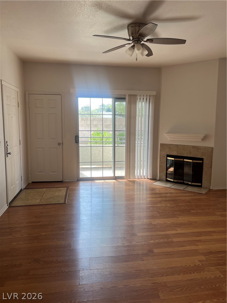 3318 North Decatur Boulevard, Unit 1174 Las Vegas, NV 89130 - Photo 4 of 23 This inviting living space features warm flooring, a cozy fireplace, and ample natural light.