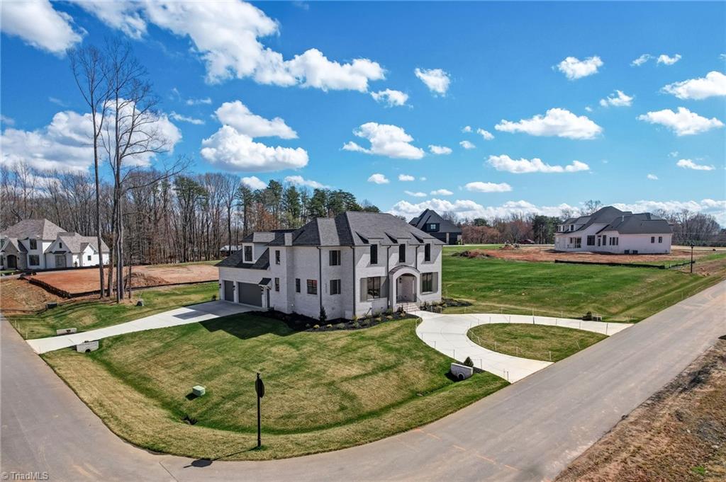6806 Brennan Way Oak Ridge, NC 27310 - Photo 42 of 50 corner drone view of property