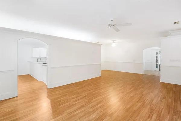 a view of a livingroom with wooden floor
