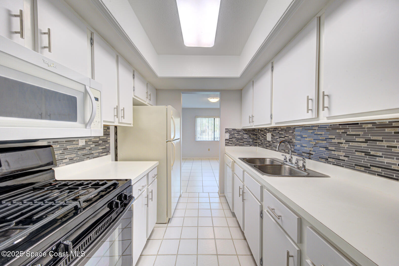4749 Sisson Road Titusville, FL 32780 - Photo 10 of 30 galley style kitchen