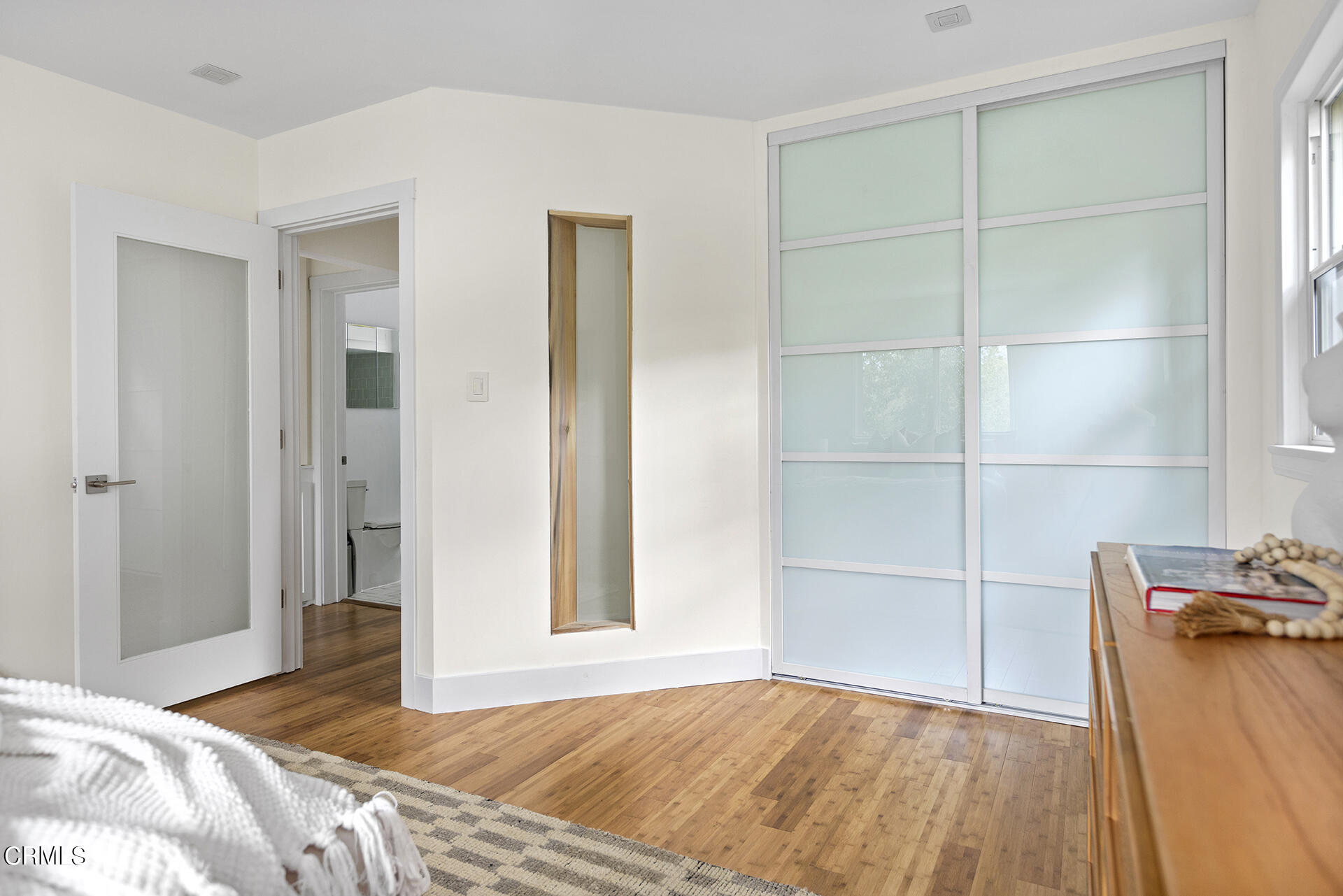 4 Lida Lane Pasadena, CA 91103 - Photo 14 of 25 a bedroom with a bed and a window