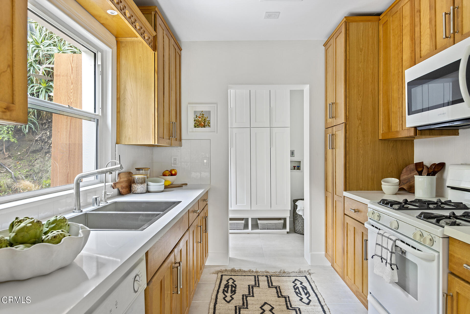 4 Lida Lane Pasadena, CA 91103 - Photo 10 of 25 a kitchen with a sink appliances and cabinets