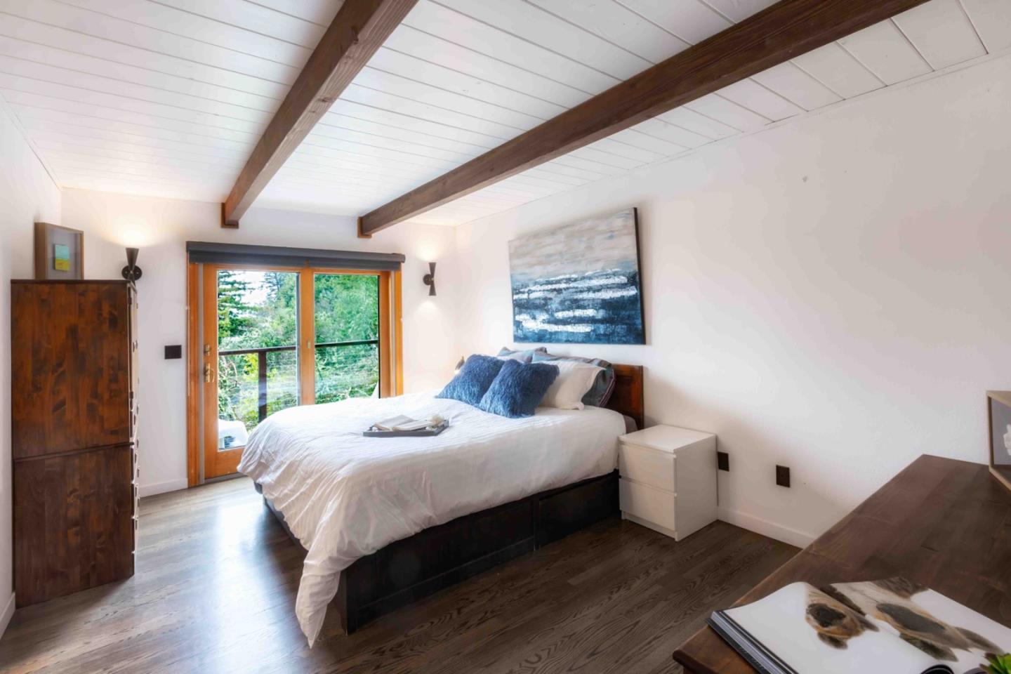 30 Ocean View Road Los Gatos, CA 95033 - Photo 12 of 40 a bedroom with a bed and a large window
