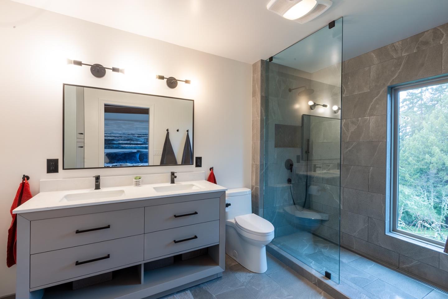 30 Ocean View Road Los Gatos, CA 95033 - Photo 15 of 40 a bathroom with a toilet sink and mirror