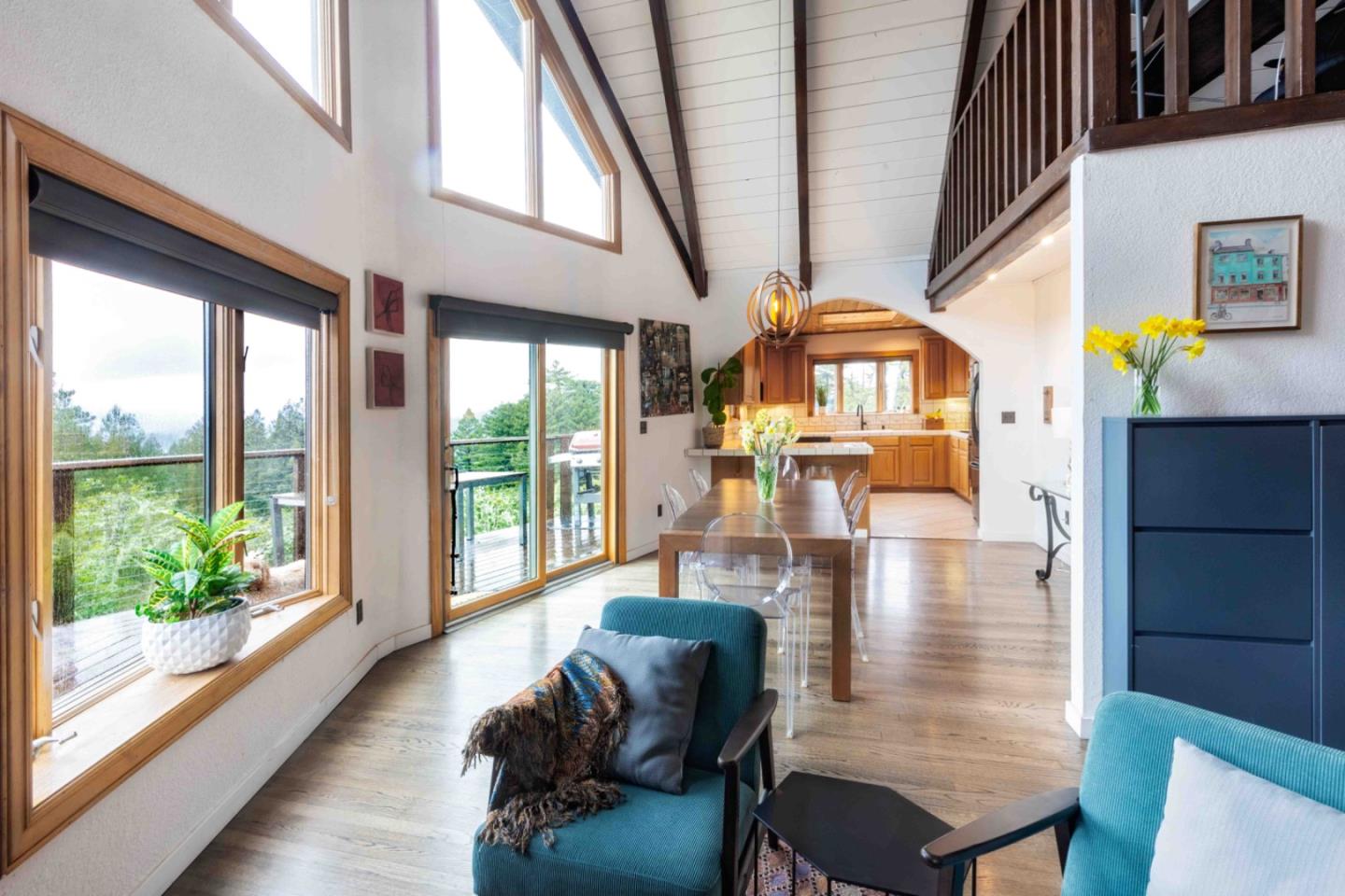 30 Ocean View Road Los Gatos, CA 95033 - Photo 2 of 40 a living room with furniture and a floor to ceiling window