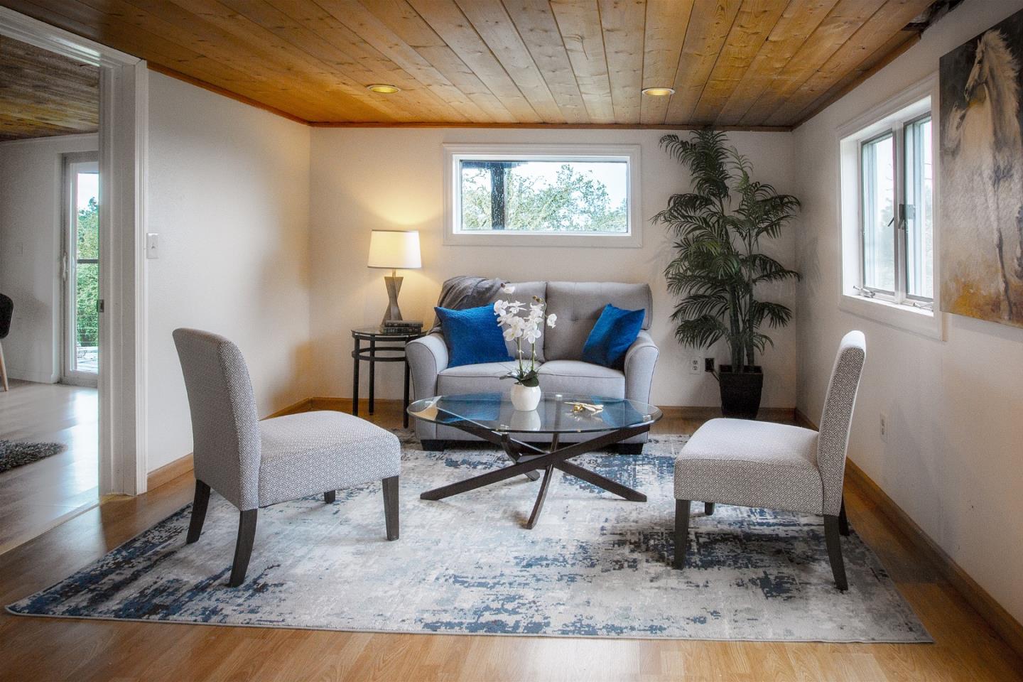30 Ocean View Road Los Gatos, CA 95033 - Photo 22 of 40 a living room with furniture and a potted plant