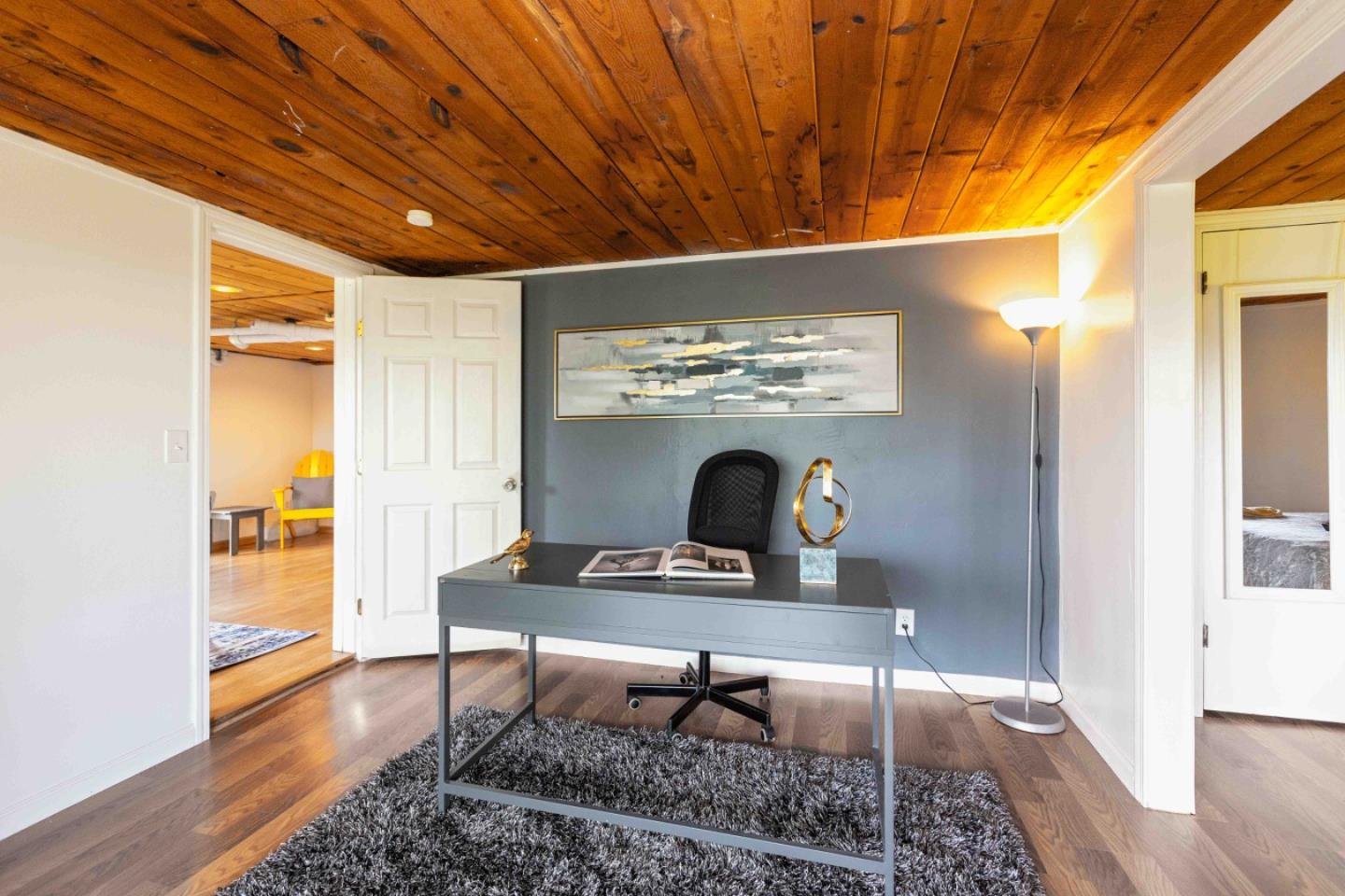 30 Ocean View Road Los Gatos, CA 95033 - Photo 23 of 40 a living room with furniture and a fireplace
