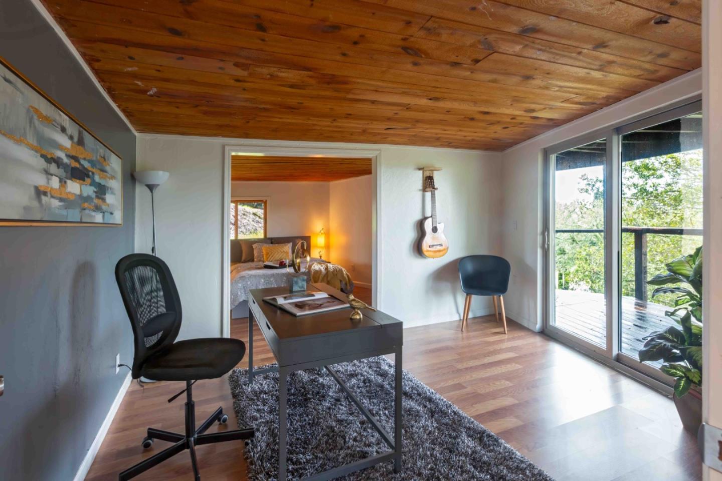 30 Ocean View Road Los Gatos, CA 95033 - Photo 24 of 40 a living room with furniture and a large window