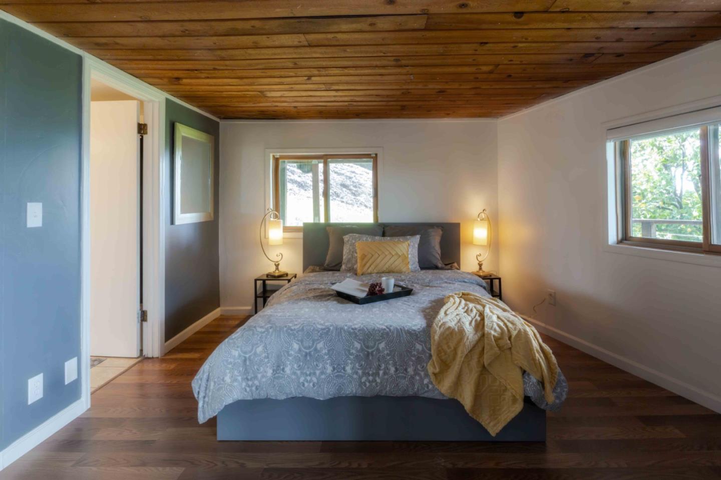 30 Ocean View Road Los Gatos, CA 95033 - Photo 28 of 40 a bedroom with bed and window