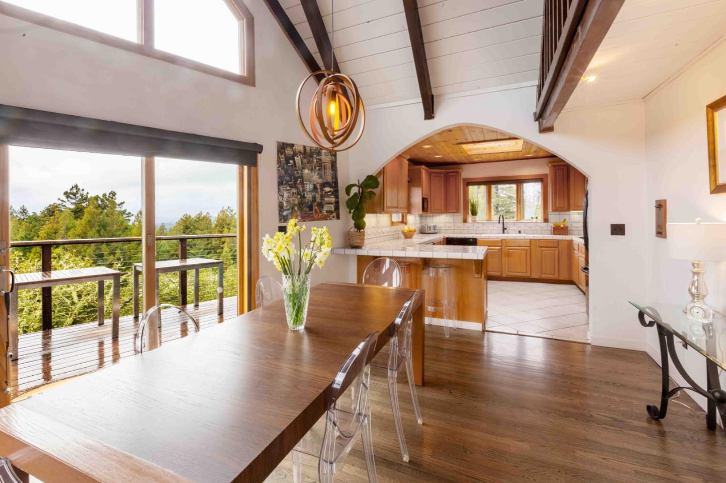 30 Ocean View Road Los Gatos, CA 95033 - Photo 4 of 40 a view of a dining room with furniture window and wooden floor