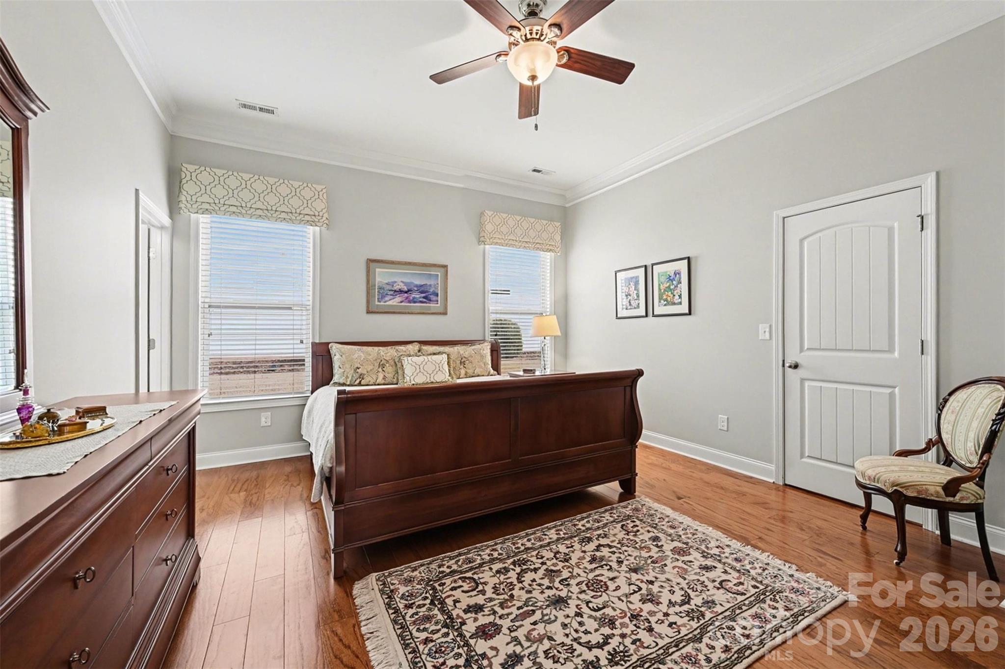 3059 Cricket Lane Lancaster, SC 29720 - Photo 19 of 32 a bedroom with a bed and wooden floor