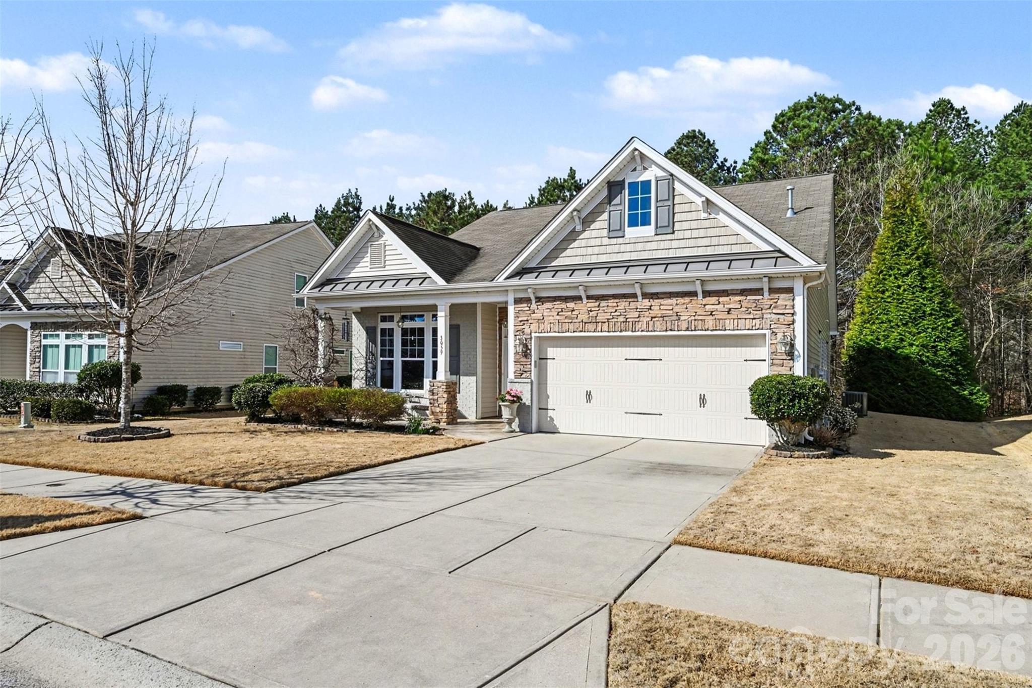 3059 Cricket Lane Lancaster, SC 29720 - Photo 2 of 32 a front view of a house with yard and garage