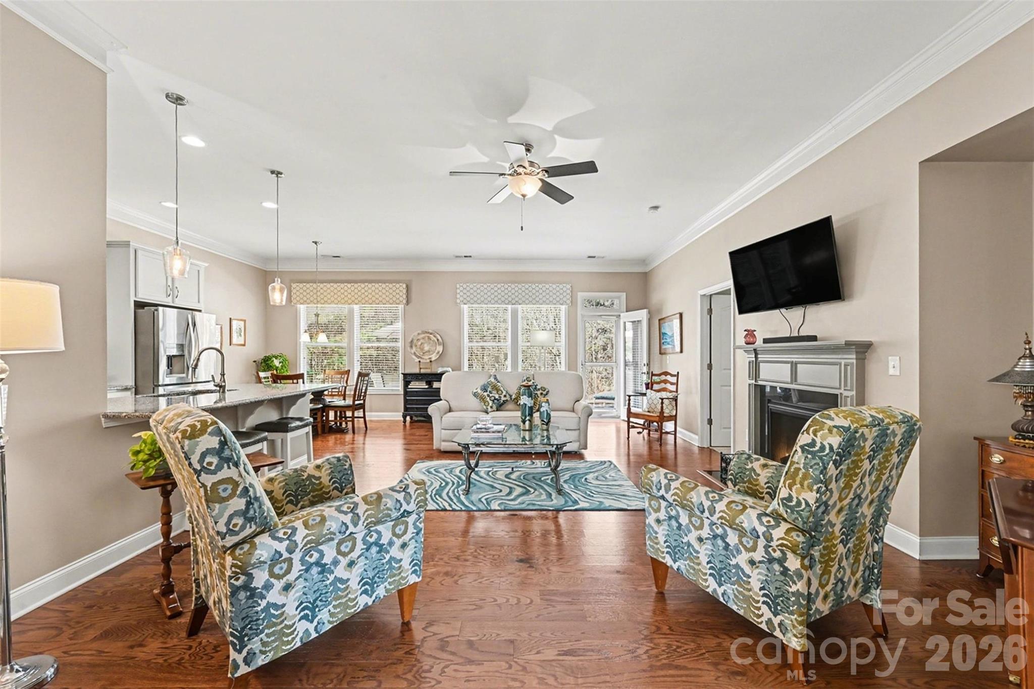 3059 Cricket Lane Lancaster, SC 29720 - Photo 5 of 32 a living room with fireplace furniture and a flat screen tv