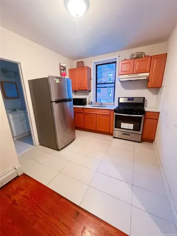 $1,890,000 | 107-02 34th Avenue | North Corona