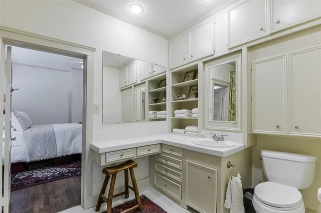 a view of a livingroom with furniture and hardwood floor