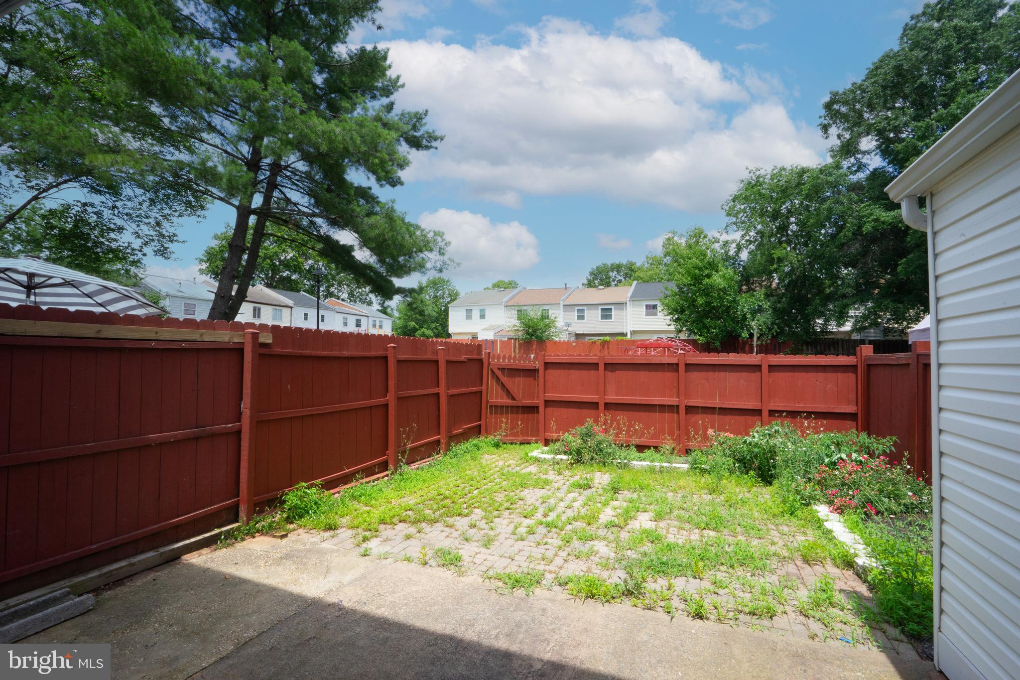 8317 Irongate Way Manassas, VA 20109 - Photo 13 of 29 a view of a fence and garden