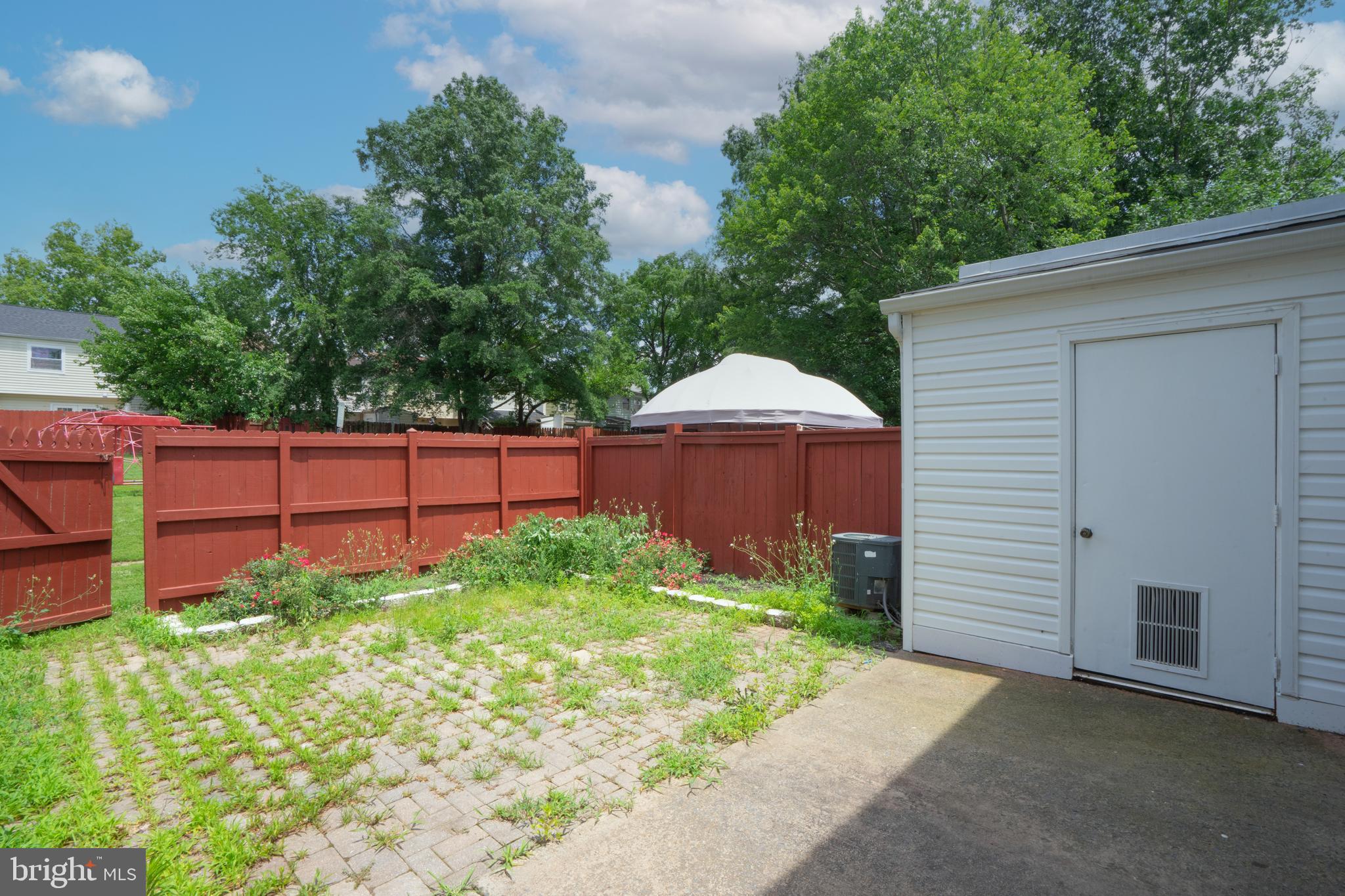 8317 Irongate Way Manassas, VA 20109 - Photo 14 of 29 a view of a backyard