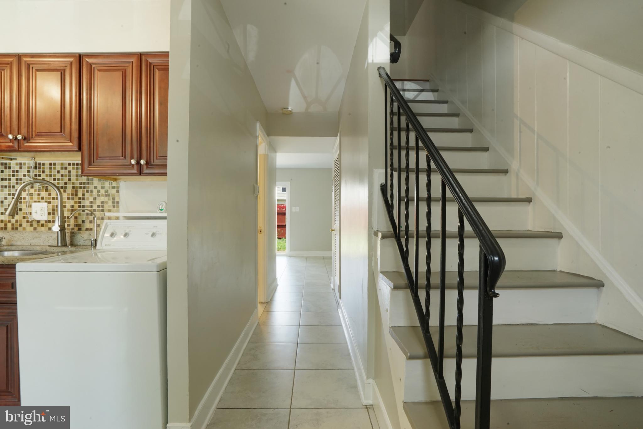 8317 Irongate Way Manassas, VA 20109 - Photo 17 of 29 a view of entryway and hall with wooden floor