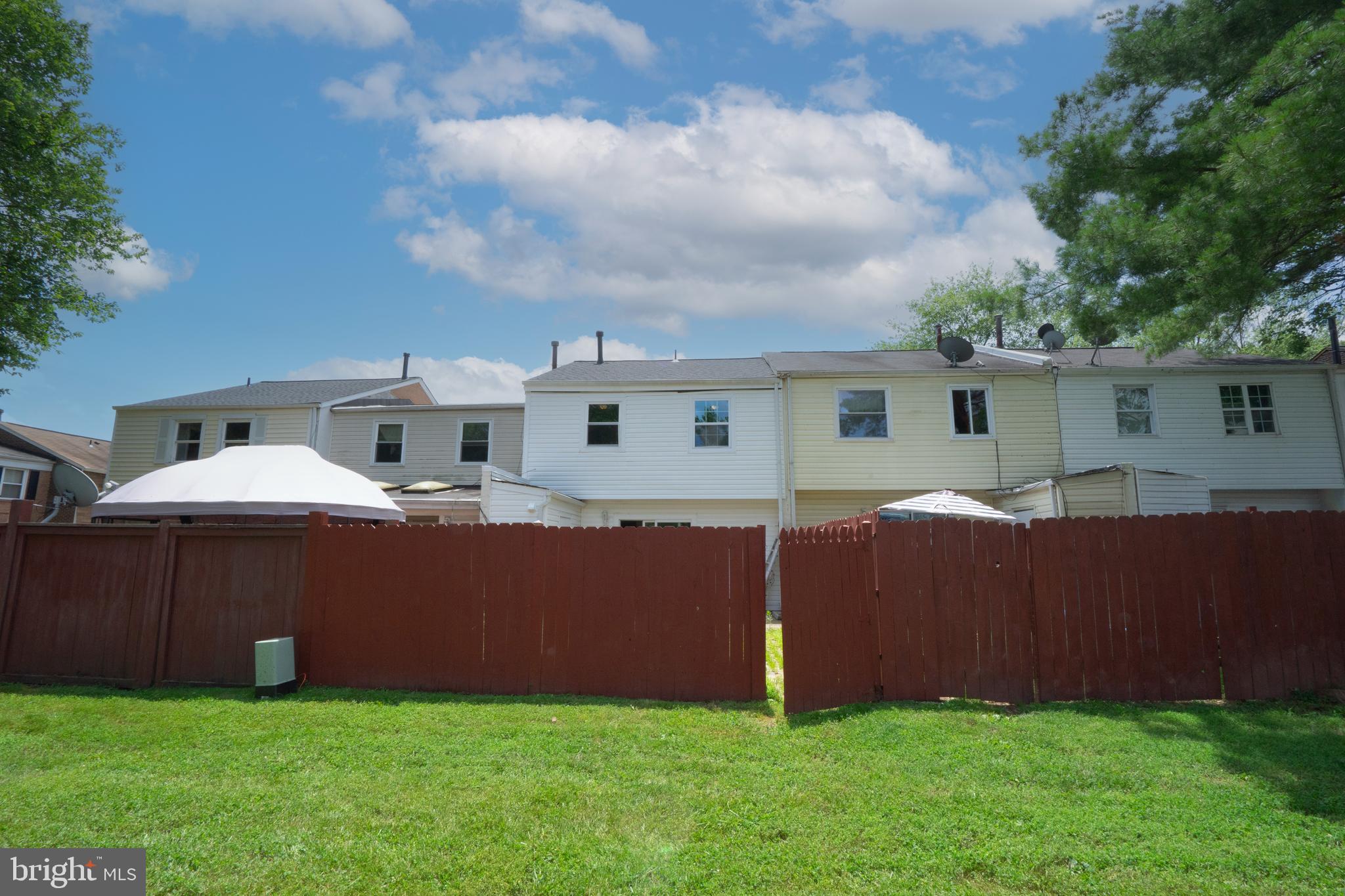 8317 Irongate Way Manassas, VA 20109 - Photo 4 of 29 a front view of house with yard and trees