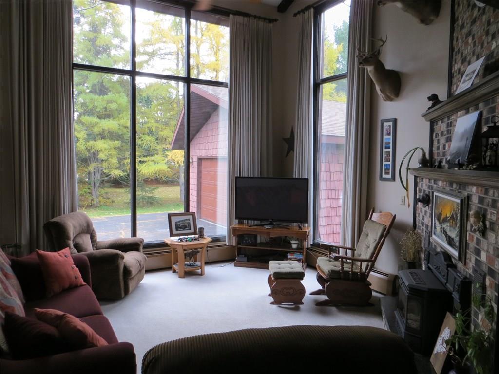99 Bradbury Road Fort Kent, ME 04743 - Photo 13 of 35 Living Room with high Cathedral Ceilings