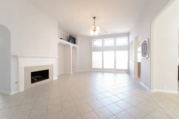 a kitchen with stainless steel appliances granite countertop a sink and a stove