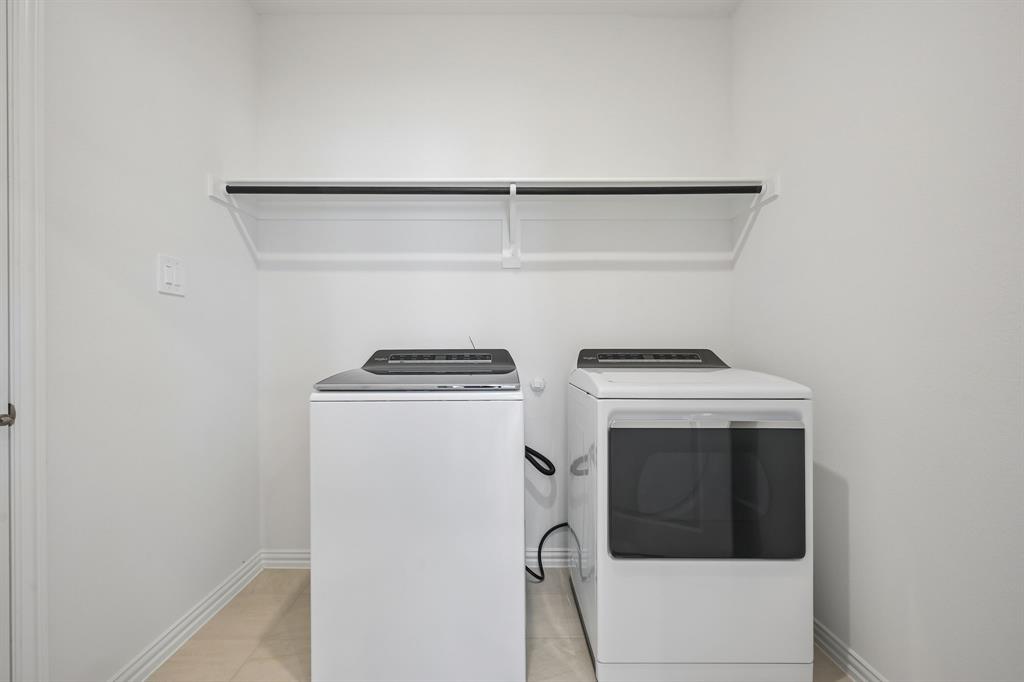 1705 Arches Road Anna, TX 75409 - Photo 19 of 33 a utility room with dryer and washer