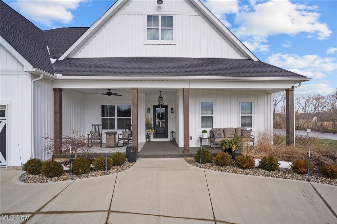 4437 Beach Road Medina, OH 44256 - Photo 4 of 50 View of front of house with ceiling fan and covered porch