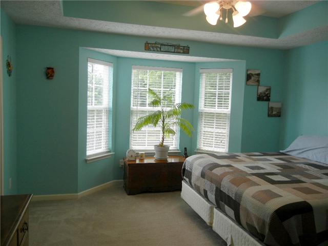 1914 Portway Road Spring Hill, TN 37174 - Photo 8 of 14 a bedroom with a bed and a window