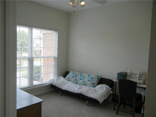 1914 Portway Road Spring Hill, TN 37174 - Photo 10 of 14 a bedroom with a bed and a window