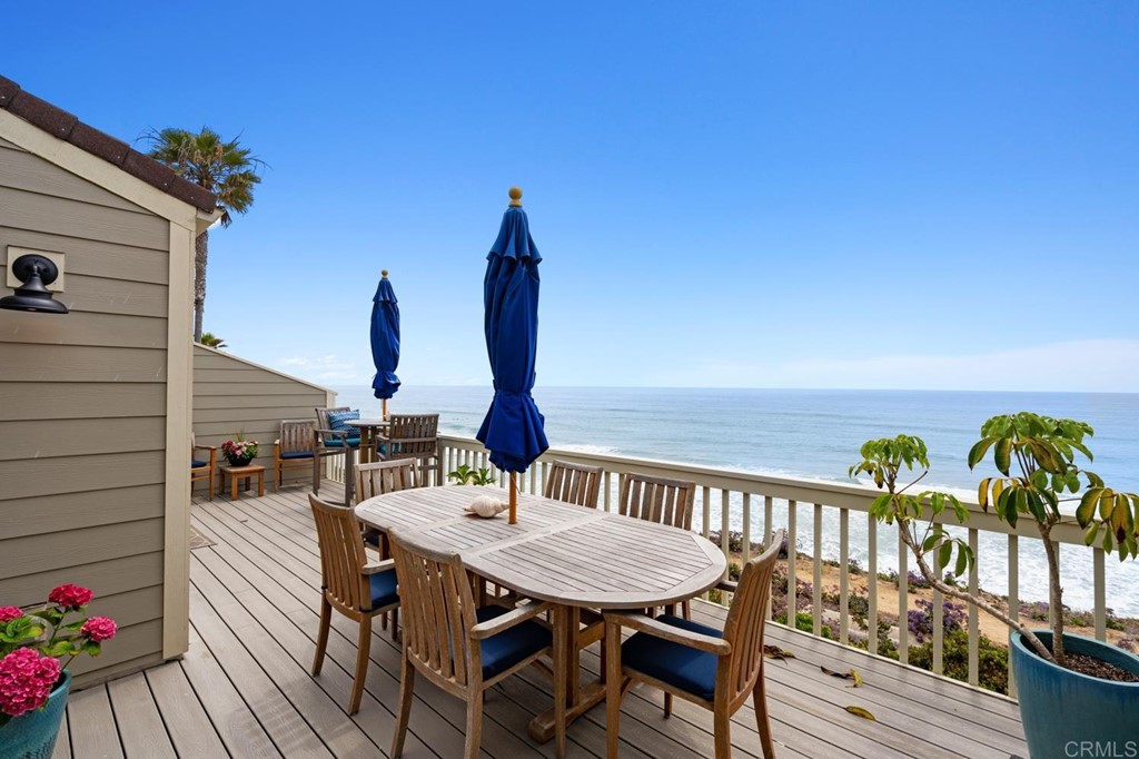 a view of a balcony with furniture
