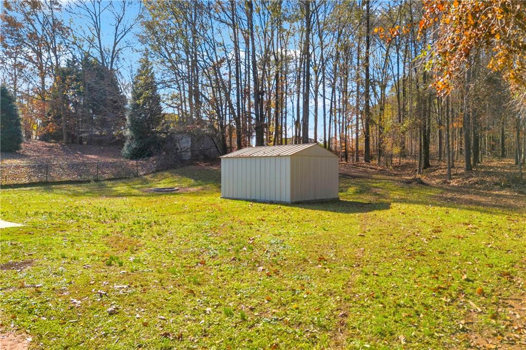 47 Chatham Court Jefferson, GA 30549 - Photo 14 of 69 a view of a swimming pool with an outdoor space and seating area