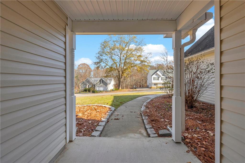 47 Chatham Court Jefferson, GA 30549 - Photo 17 of 69 a view of a porch with a floor to ceiling window and a yard