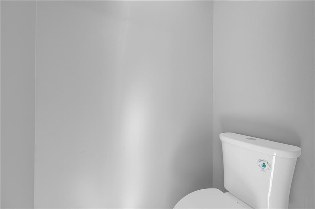 47 Chatham Court Jefferson, GA 30549 - Photo 50 of 69 a white toilet sitting next to a white wall