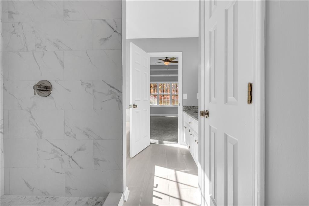 47 Chatham Court Jefferson, GA 30549 - Photo 51 of 69 a bathroom with a shower and a sink