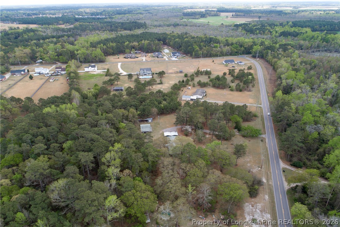 7307 Roslin Farm Road Hope Mills, NC 28348 - Photo 43 of 46 an aerial view of a city