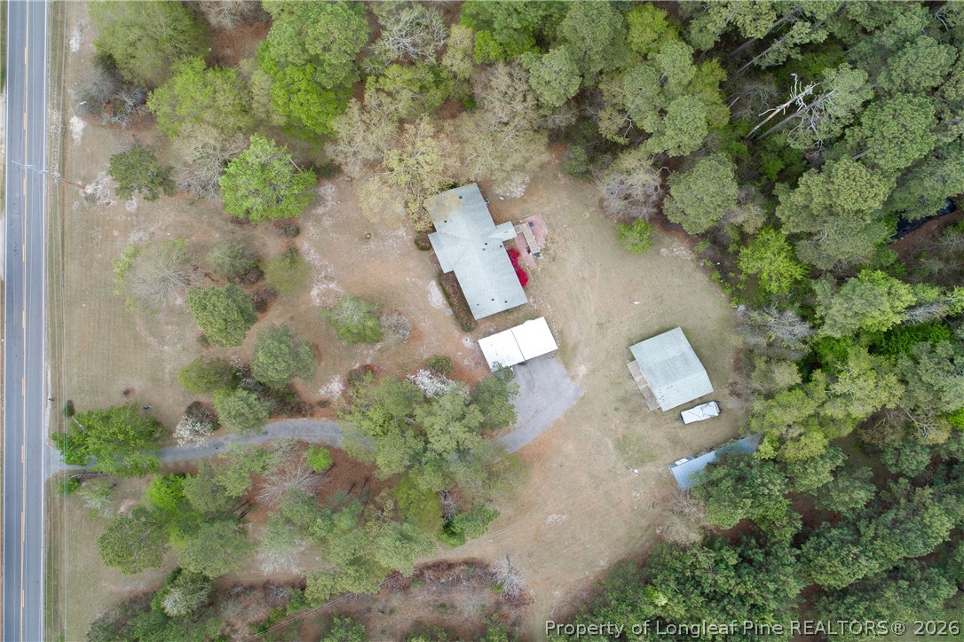 7307 Roslin Farm Road Hope Mills, NC 28348 - Photo 46 of 46 an aerial view of residential house with outdoor space