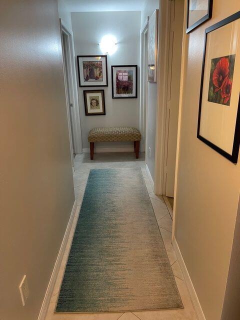 233 South Federal Highway, Unit 301 Boca Raton, FL 33432 - Photo 13 of 30 a view of a hallway with paintings on the wall