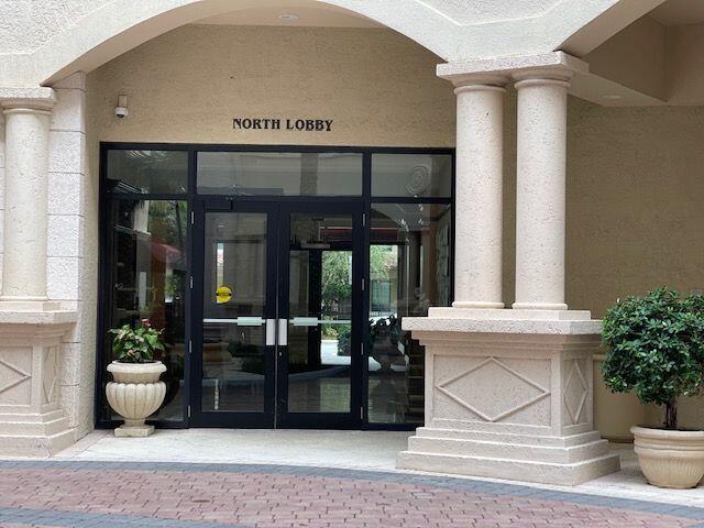 233 South Federal Highway, Unit 301 Boca Raton, FL 33432 - Photo 27 of 30 front view of a building with potted plants